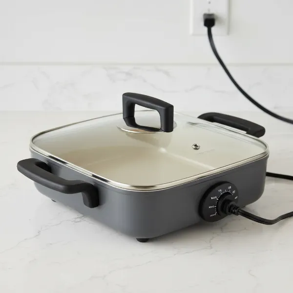 farberware 12-inch electric skillet with glass lid, cool-touch handles, and temperature control