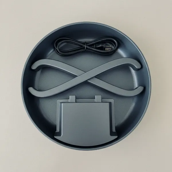 Presto 16-inch Foldaway Electric Skillet with base and handles detached and stored inside for compact storage.